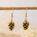 Vintage bohemian pine cone drop earrings with metallic texture on a natural branch - Pine Cone Pendant Style (9748)