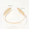 Detail shot of golden laurel leaf headband showing intricate vein textures and metal finish - Metal Headband-Two Gold Leaves