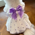 Detail of purple heart print pet dress featuring ruffled collar and satin bow on wood floor - XS (Bust 30cm) / Purple Heart Dress