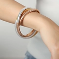 Set di tre bracciali a serpente tricolore in oro, argento e oro rosa lucido - Oro Acciaio Oro Rosa Misto Sottile