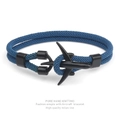 Detail of hand-knitted blue Milan rope bracelet with a matte black aircraft shaped clasp - Teal Rope Black Airplane