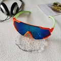 Kids sports sunglasses in vibrant orange and neon green with blue reflective lenses - Orange