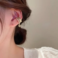 Close-up of gold layered ear cuff with zircons and heart pendant on a female model - 13# Quilted Heart Pendant Style (Gold)