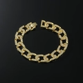 Cavigliera uomo a catena cubana dorata con strass scintillanti su sfondo nero riflettente - Oro