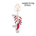 Golden keychain with realistic red chili pepper pendants and detailed weight dimensions - BG00142-01 Red Large Chili with Mini Red Peppers Keychain (Gold)