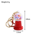 Detailed view of a mini candy machine keychain with colorful beads and dimensions - Red
