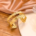 Retro golden open cuff bracelet with unique irregular pleated texture on white ceramic - Gold Wrinkled Wave