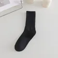 Chaussettes mi-hautes noires classiques en maille côtelée pour femmes en coton épais - Taille unique / Noir