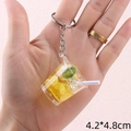 Miniature lemon tea keychain with artificial ice and leaves measuring 4.2x4.8cm - Yellow