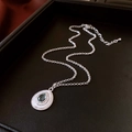 Detailed macro view of pear-shaped green zircon pendant with silver beaded edges - Silver Green Waterdrop Pendant Necklace (47#)
