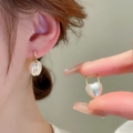 Elegant gold plated heart-shaped pearl hoop earrings with a subtle iridescent glow - Gold Rectangular Hoop Pearl Texture Heart Earrings(ED2026)