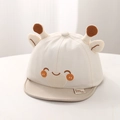 Dettaglio del cappellino da neonato con orecchie di giraffa in peluche e cotone - 46-48cm (6-20 Mesi) / Cachi Chiaro