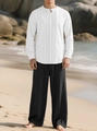Détail de la chemise en lin blanc et du pantalon à cordon noir sur la plage - S / Blanc + Noir