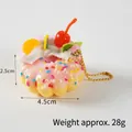 Pink strawberry donut keychain with faux cream and fruit deco, size 4.5cm by 2.5cm - Gold Bead Chain / Pink