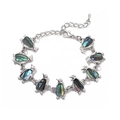 Silver penguin bracelet with colorful abalone shell inlay charms and extension chain - Penguin