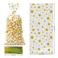 Detail showing dimensions of clear gold star gift bags with gold twist ties for candy - Gold Star Type 1