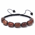 Detail of reddish-brown natural stone beads with black hand-woven adjustable cord - Red Stone Bracelet