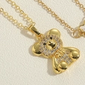 3D golden bear pendant necklace with sparkling cubic zirconia on a delicate gold chain - Sitting Bear