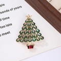 Detailed macro view of a gold Christmas tree brooch with multi-colored rhinestones - Style 20 (6*4.3cm)