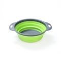 Collapsible silicone kitchen strainer in green and grey color with folding design - Small Round / Green
