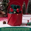 Christmas gift bag in burgundy leather and green velvet with a red bow and bell - Red Bucket + Green Velvet Bag with Bow