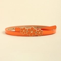 Close-up of orange skinny belt for women featuring gold-trimmed floral buckle decoration - 100cm / Orange