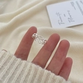 S925 sterling silver minimalist heart ring with hollowed design on model finger - Hollow Heart