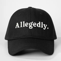 Detailed close-up of white Allegedly embroidery on a black cotton baseball cap - Embroidered Allegedly. / Black