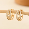 Macro detail of champagne gold hoop earrings with multi-layer woven zircon stones - EH213 Cross Woven Pave
