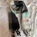 Thick warm plaid mohair scarf in black, grey, beige, and light green with tassels - Black