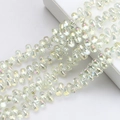 Macro shot of 6x9mm teardrop iridescent glass crystal beads for DIY jewelry making - 100 Pcs/Pack / Crystal Yellow