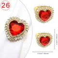 Elegant gold napkin ring featuring a large red heart rhinestone with sparkling crystals - Golden Heart Large Red Zirconia