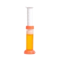 Orange scented toilet cleaning gel tube with transparent syringe applicator for freshness - Fragrans