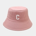 Detailed close-up of pink cotton bucket hat featuring white embroidered C letter design - M (56-58cm) / Pink