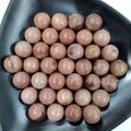Natural 25mm brown quartz crystal spheres with unique marble texture in black bowl - 25mm No Hole Sphere / Purple Aventurine