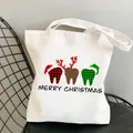 White canvas tote bag with Christmas themed tooth print and Merry Christmas slogan - C10 Merry Christmas Teeth Group
