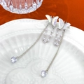 Elegant silver butterfly tassel earrings with iridescent finish and pearls on white plate - Double Row Artificial Pearl Butterfly Rhinestone Style (M-092)