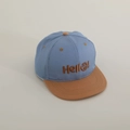 Dettaglio del cappellino hip hop blu e kaki con ricamo Hello smile per bambini - 50-54cm / Blu scuro