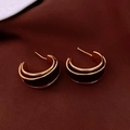 Detail of vintage C-shaped two-tone gold flower enamel hoop earrings on textured fabric - Gold-Brown (Enamel C-Shape)