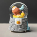 Capybara crystal ball night light with capybara in bathtub and grey stone base - 016 Yellow Duck / Large 100 Snow+Light+Music