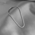 Elegant silver tennis bracelet featuring round-cut AAA cubic zirconia on grey satin - Round 3mm / Silver