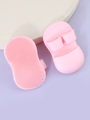 Detail of pink silicone facial cleansing brush with soft bristles and finger ring handle - Finger Cleansing Brush / Pink