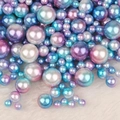 Macro detail of iridescent blue-purple gradient faux pearls on soft white plush fabric - No Hole / 4/6/8/10mm Mixed, approx 250 Pieces / Lake Blue Purple Gradient
