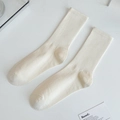 Cream ribbed mid-calf cotton socks in minimalist lifestyle setting for women - One Size / Beige