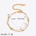 Bracciale a doppio strato in acciaio inossidabile dorato con perle bianche da 6mm e chiusura OT - Oro