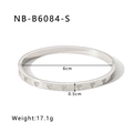 Detail view of silver heart pattern bangle with dimensions 6cm diameter and 0.5cm width - Silver Style (NB-B6084-S)