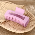 Matte light purple rectangular claw clip for hair styling placed in a woven basket - 8.5cm Pink Purple