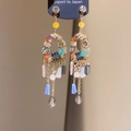 Close-up of golden tassel earrings with multicolored crystals, pearls, and glass beads - Gold Multicolor Rhinestone Tassel (24#)