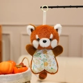 Cute orange panda plush keychain with floral bib and light green ring clip attachment - Raccoon