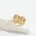 Gothic gold-plated bow earrings with braided texture and white zircons on white stone - Double Layer Intertwined Zirconia
